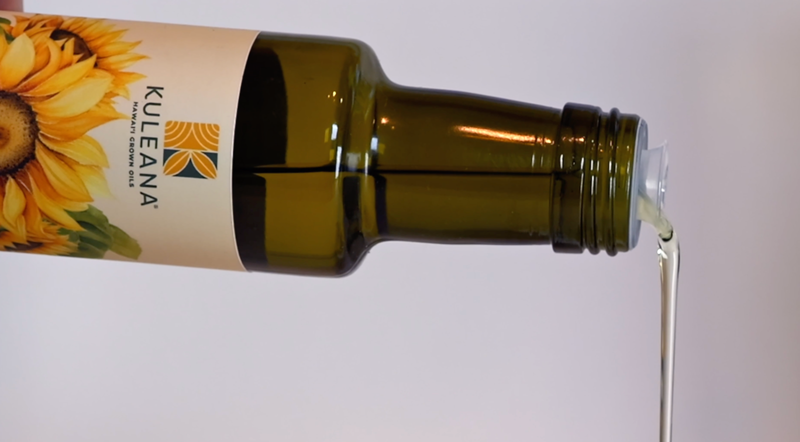 bottole of sunflower oil pouring